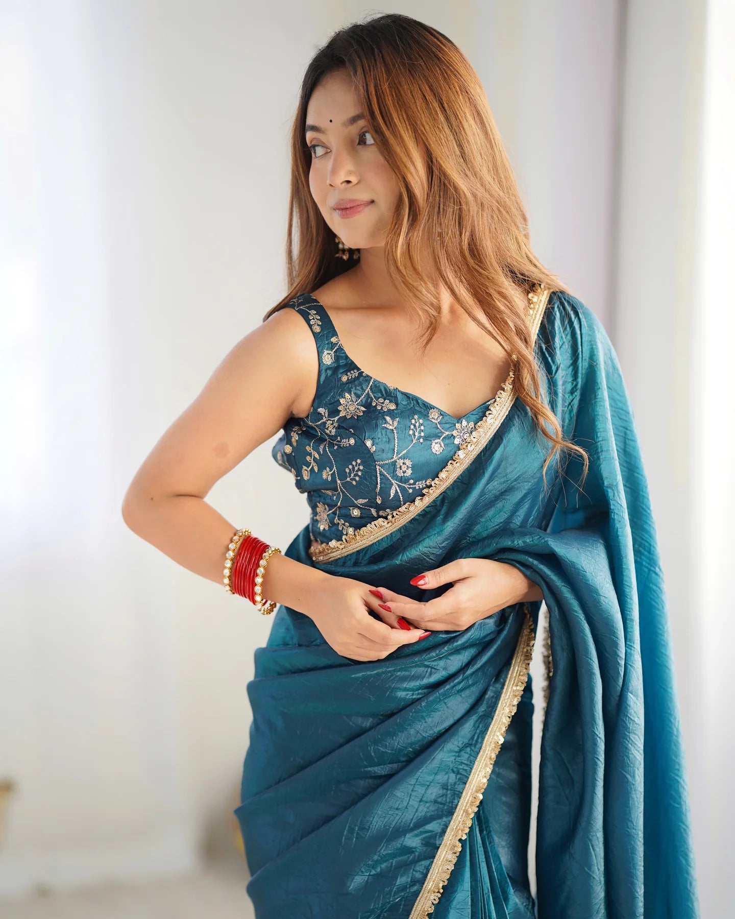 Teal Blue Pre-Draped Tissue Silk Saree with Shimmer Elegance