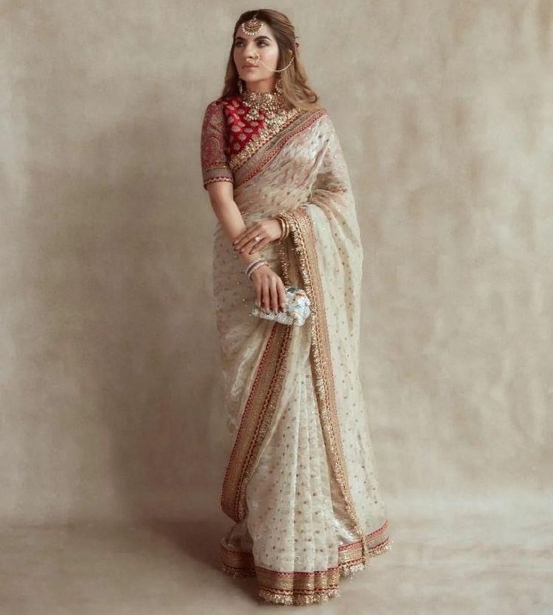 Elegant Off-White Organza Saree with Fine Thread & Sequin Embroidery